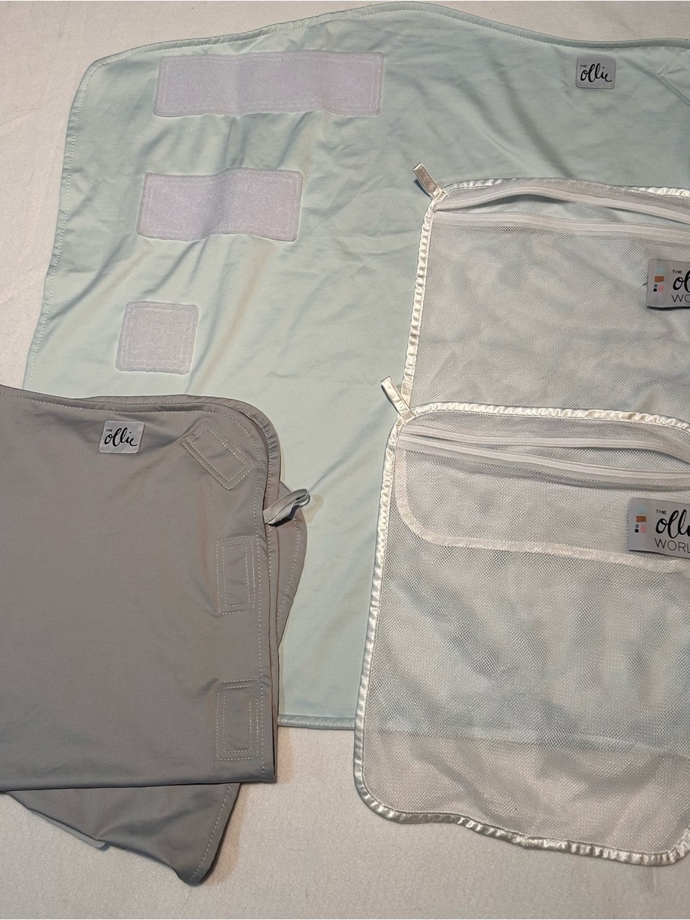 The Ollie World Swaddle Set - 2 swaddles 2 mesh laundry bags
